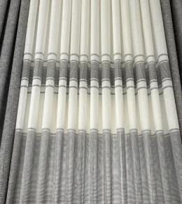 پرده پانچ طوسی مدل روبان با کنارپرده نگین‌ کاری ‌شده